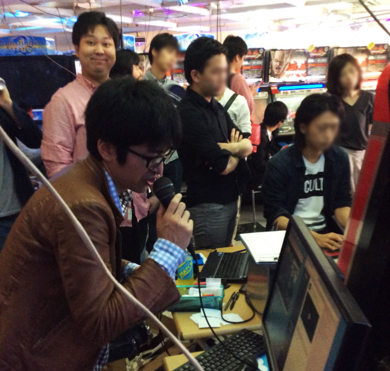 Haregoro commentates a tournament at TLL while Kabao smiles!